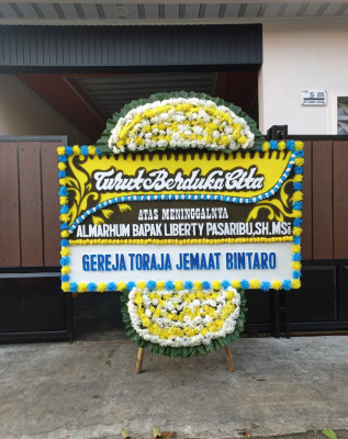 Papan Bunga Duka di Pagutan Timur